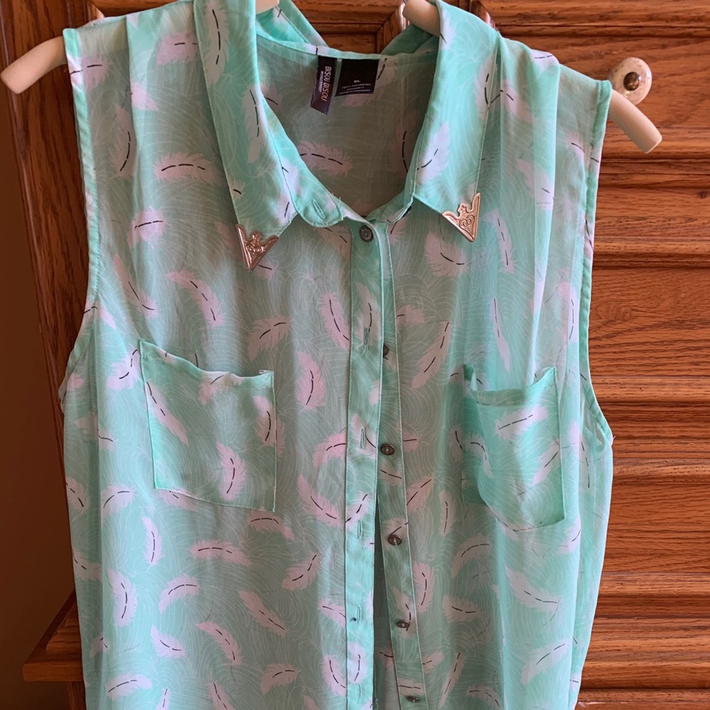 Sleeveless hi low tunic top